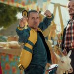 Cabras da Peste: Elenco e Tudo Sobre o Filme 18 Dois homens com cabra em feira.